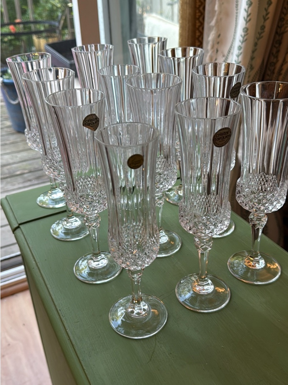 11 Cristal D’Arques French leaded crystal champagne flutes NEW with stickers.